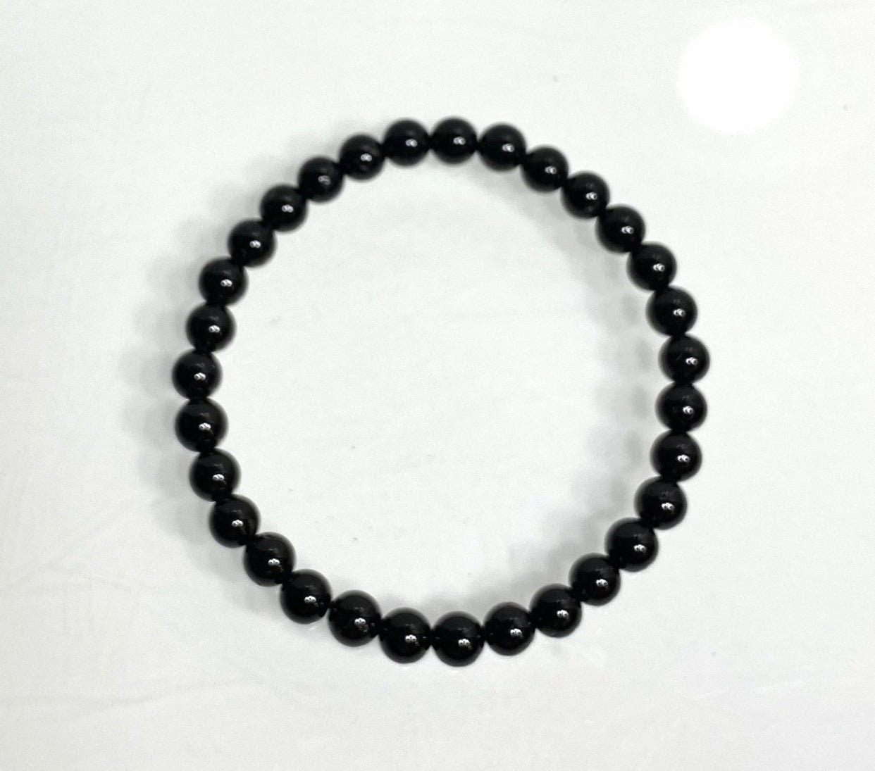 Black Tourmaline Bracelet with 8mm Beads for Protection Energy Shielding and Inner Strength Mystic Crystal Jewelry for Empaths and Seekers - Crystals for everyone • Crystals And Cord