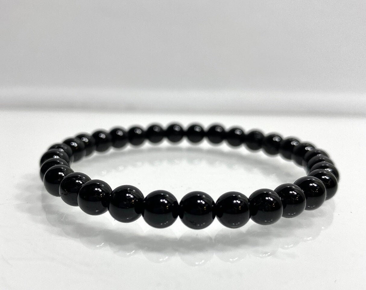 Black Tourmaline Bracelet with 8mm Beads for Protection Energy Shielding and Inner Strength Mystic Crystal Jewelry for Empaths and Seekers - Crystals for everyone • Crystals And Cord