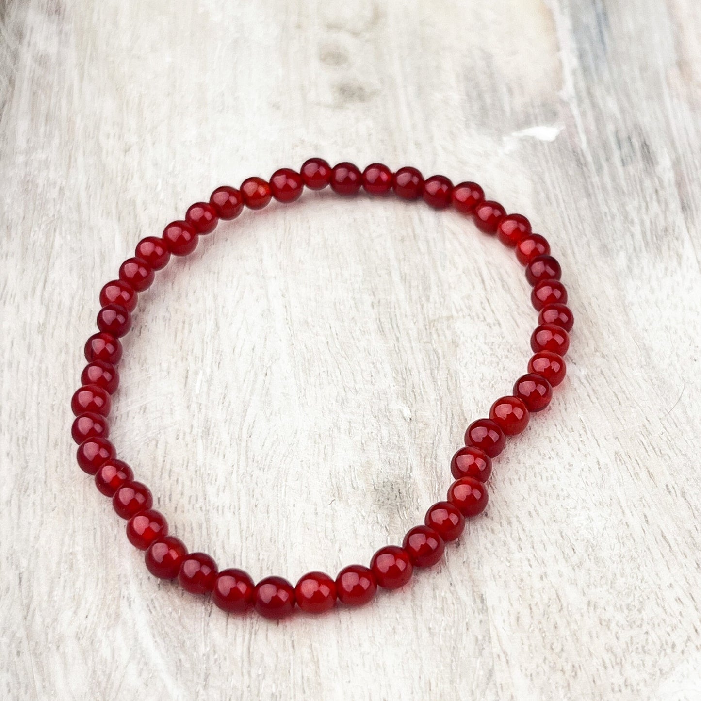 Vibrant Carnelian Gemstone Bracelet for Creativity and Confidence - 4mm Stone Beads, Elastic Band, 7.5 inches - Crystals for everyone • Crystals And Cord