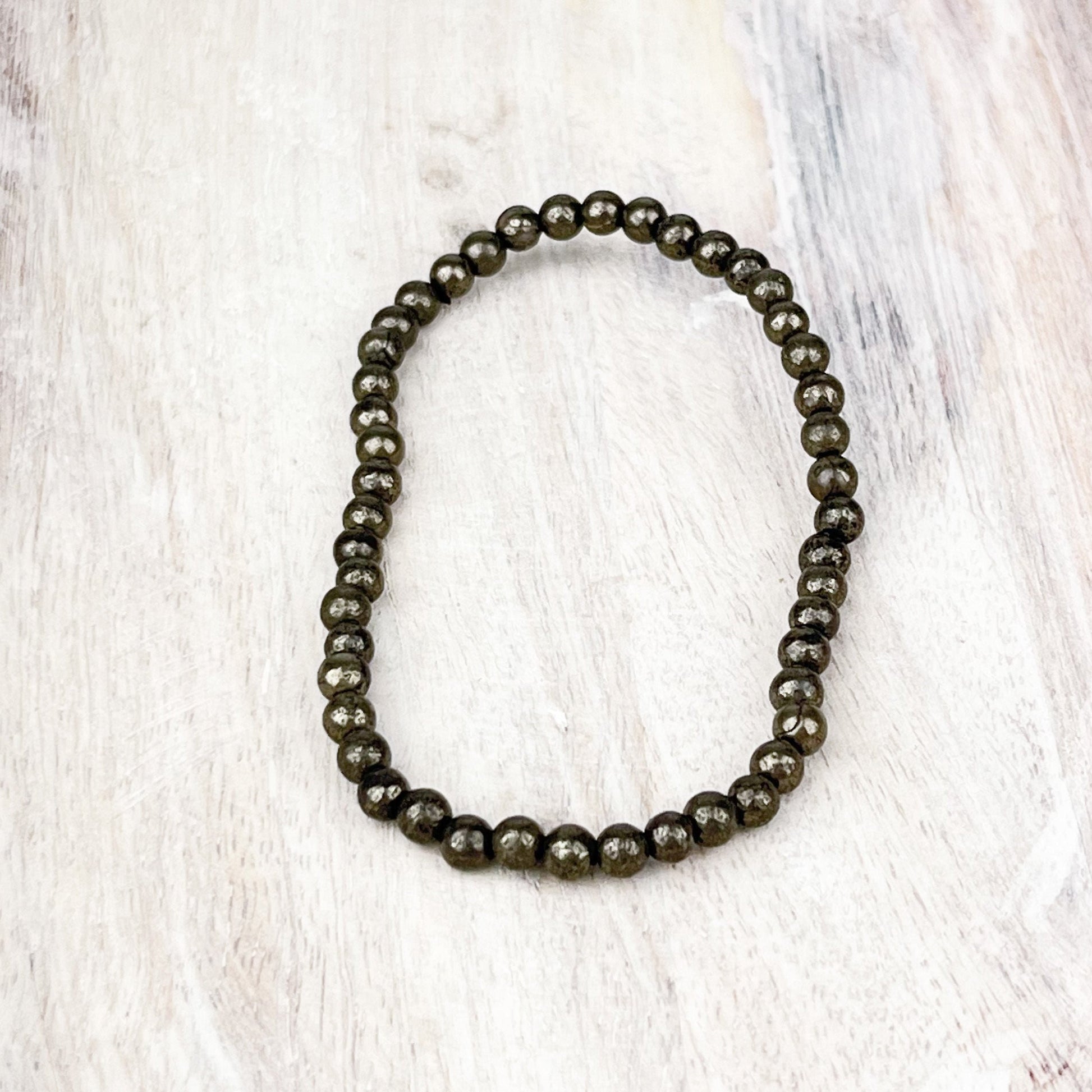 Pyrite Gemstone Bracelet: Protection Stone for New Beginnings and Prosperity - 4mm Beads - 7.5 Inches - Crystals for everyone • Crystals And Cord