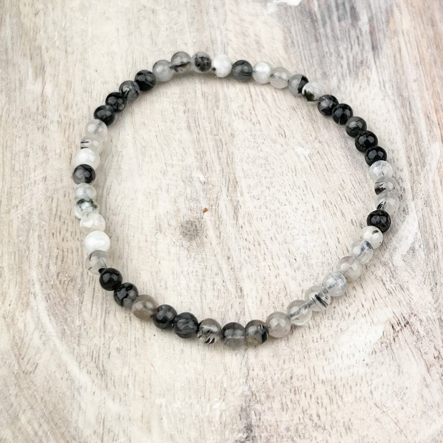 Gemstone Bracelet with Tourmalated Quartz for Purifying Energies - 4mm Stone Beads on Elastic - Spiritual Shield Stone - Crystals for everyone • Crystals And Cord