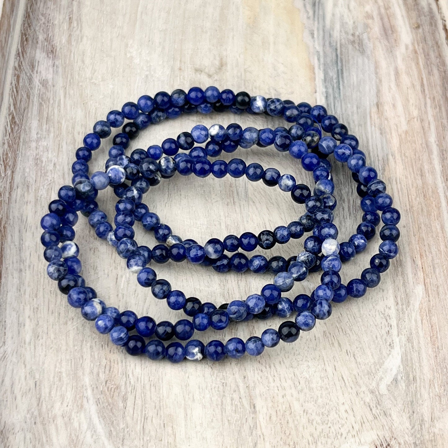 Sodalite Gemstone Bracelet: Grounding & Harmony, Intuition - Balance, 4mm Beads, 7.5 Inches - Crystals for everyone • Crystals And Cord