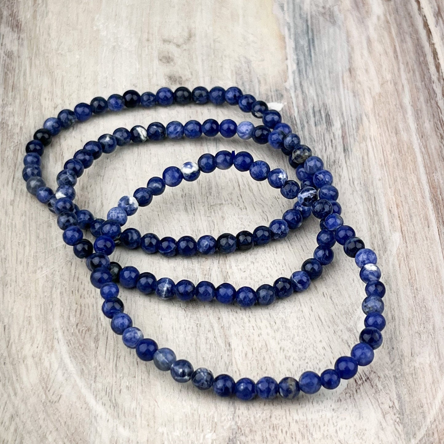 Sodalite Gemstone Bracelet: Grounding & Harmony, Intuition - Balance, 4mm Beads, 7.5 Inches - Crystals for everyone • Crystals And Cord