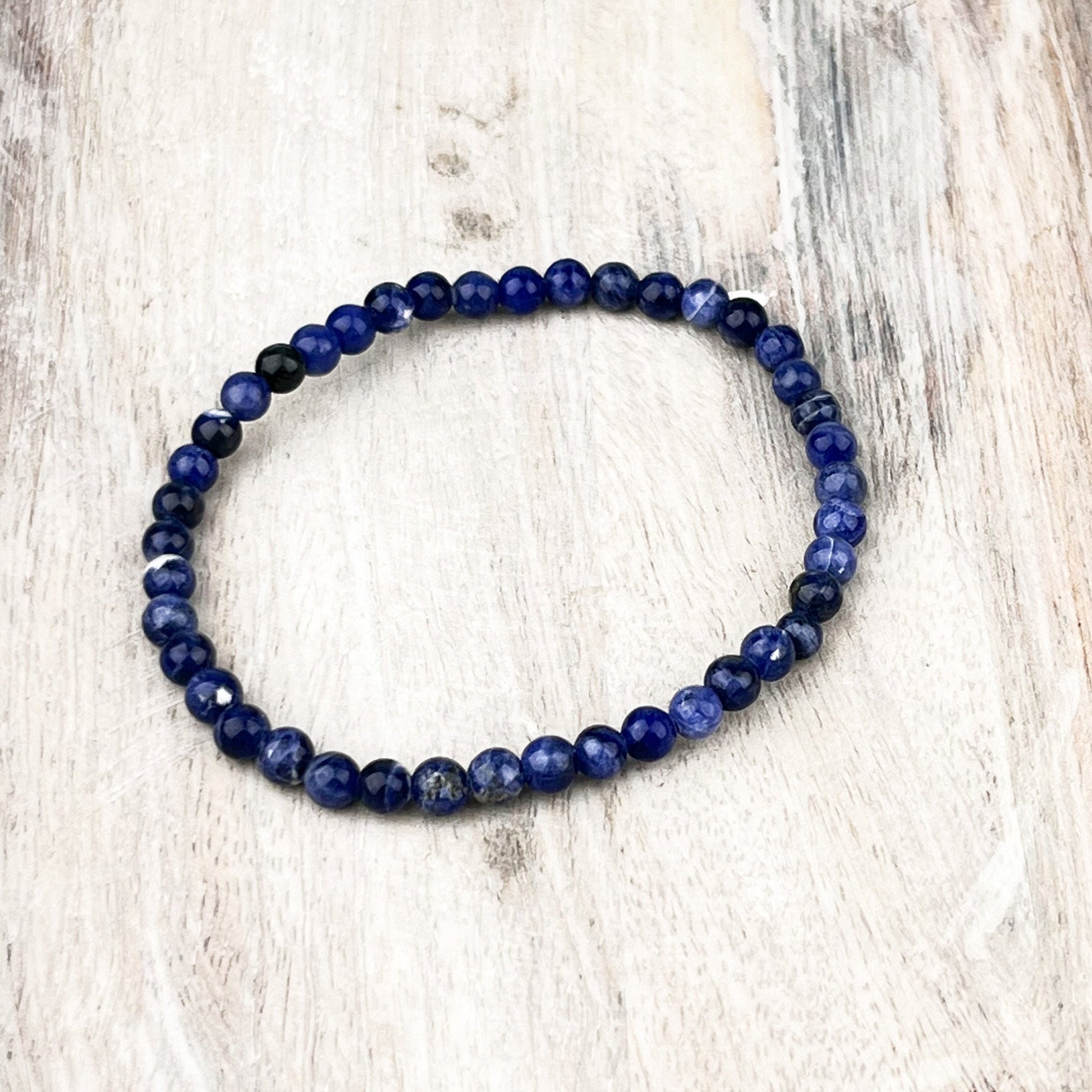 Sodalite Gemstone Bracelet: Grounding & Harmony, Intuition - Balance, 4mm Beads, 7.5 Inches - Crystals for everyone • Crystals And Cord