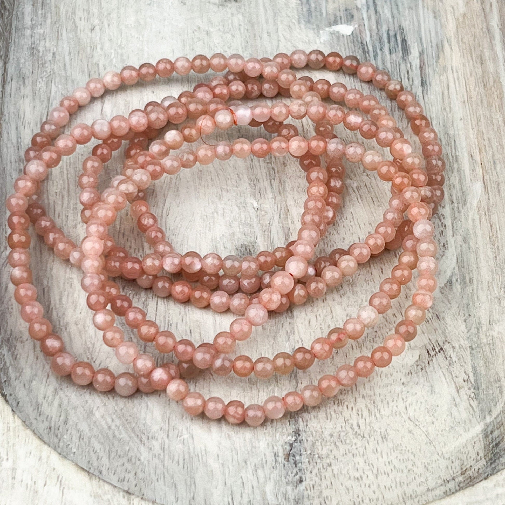 Emotional Healing Bracelet with Peach Moonstone 4mm Beads on Elastic - Handmade Gemstone Jewelry for Chakra Balancing and Warmth - Crystals for everyone • Crystals And Cord