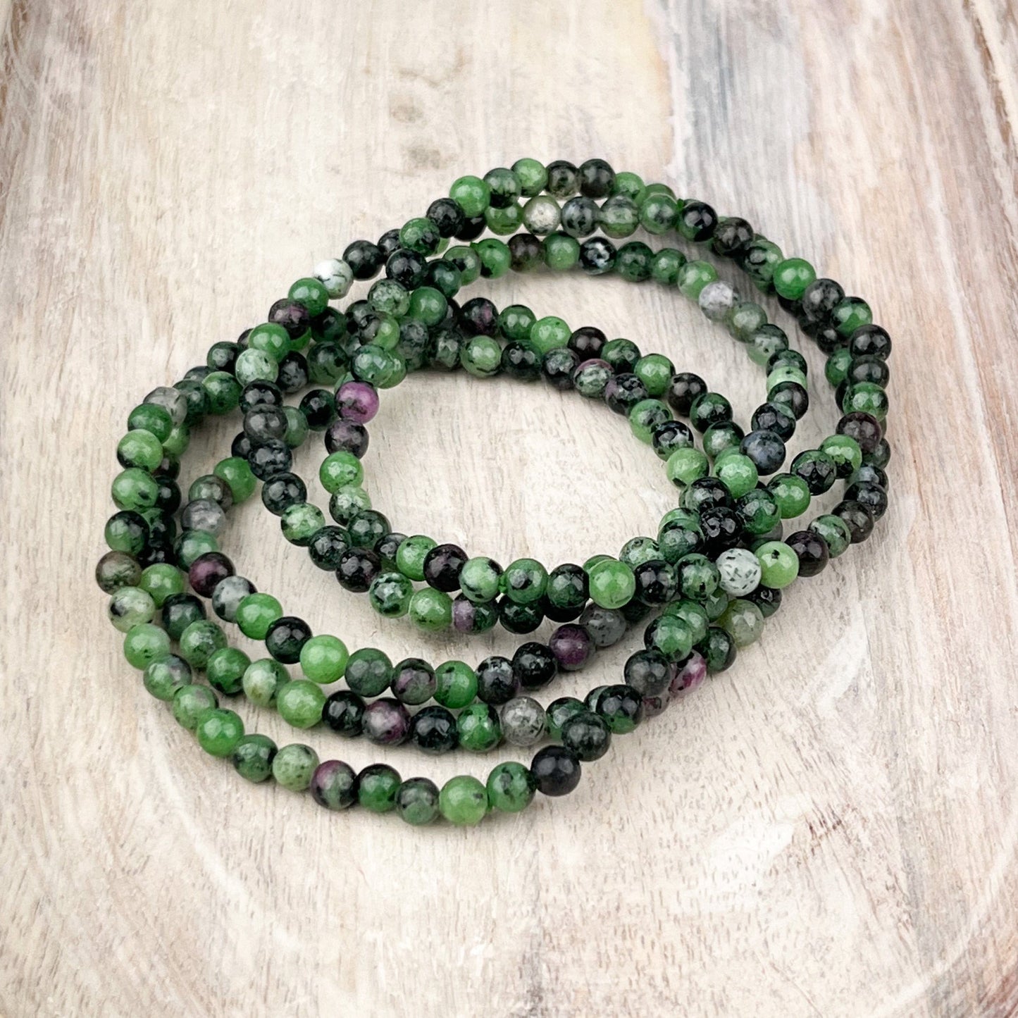 Ruby Zoisite Gemstone Bracelet - 4mm Beads - Elastic Stretch - Stone of Gratitude for Happiness, Abundance & Vitality - Crystals for everyone • Crystals And Cord