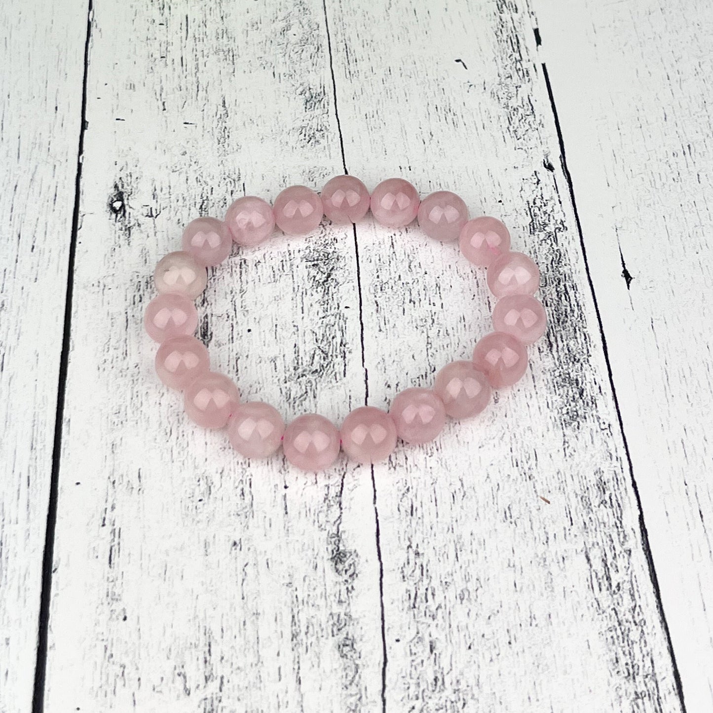 Natural Rose Quartz Gemstone Bracelet with 10mm Beads - Heart Healing, Love, Friendship - Elastic 7.5 inches - Calming, Comforting Energy - Crystals for everyone • Crystals And Cord