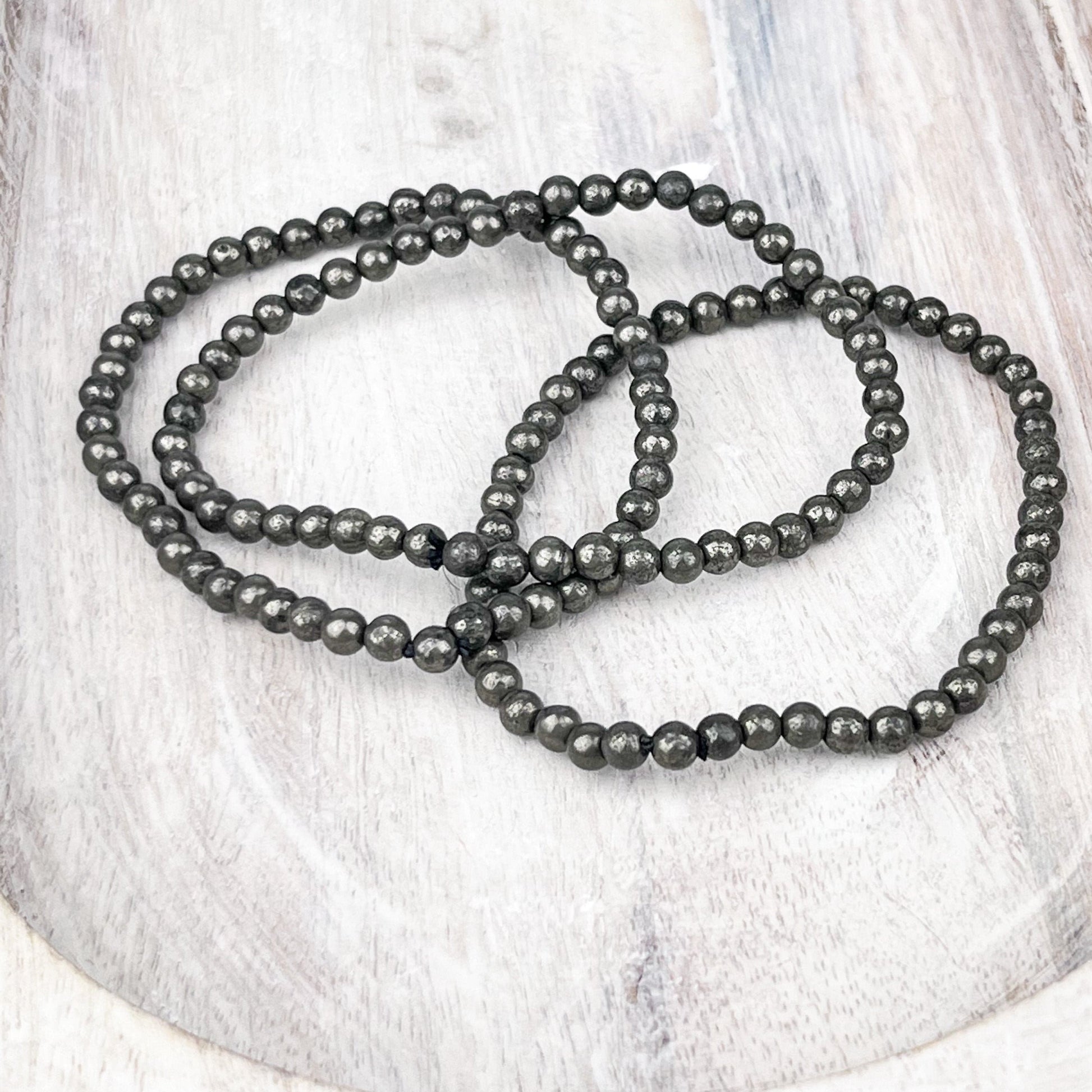 Pyrite Gemstone Bracelet: Protection Stone for New Beginnings and Prosperity - 4mm Beads - 7.5 Inches - Crystals for everyone • Crystals And Cord