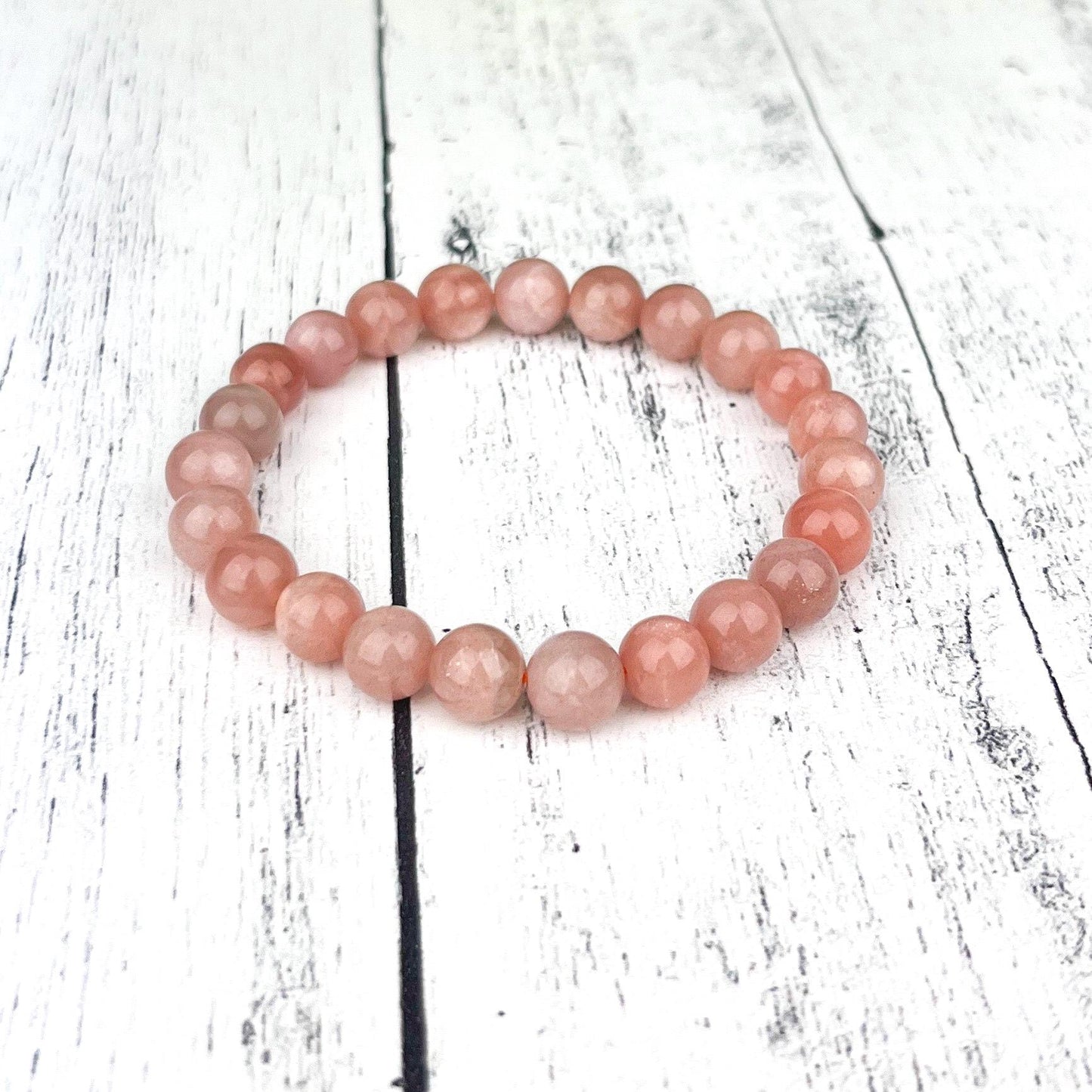 Emotional Healing Peach Moonstone Bracelet – 8mm Natural Gemstone Beads on Stretch Cord for Self-Love, Soothing Energy & Inner Balance - Crystals for everyone • Crystals And Cord