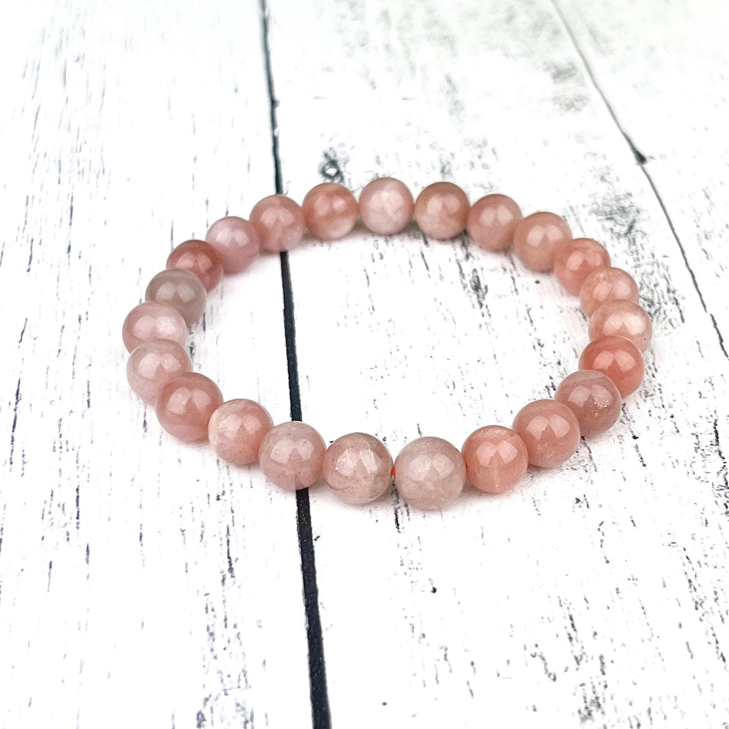 Emotional Healing Peach Moonstone Bracelet – 8mm Natural Gemstone Beads on Stretch Cord for Self-Love, Soothing Energy & Inner Balance - Crystals for everyone • Crystals And Cord