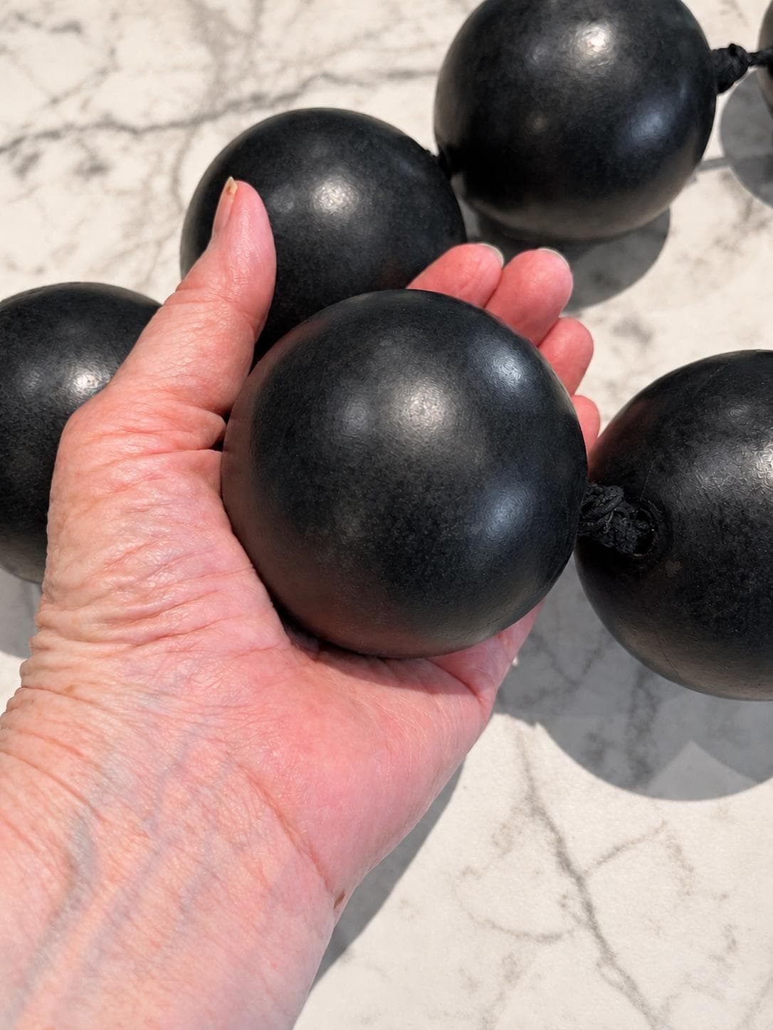 Oversized Black Wood Orb Garland with Agate Slice and Quartz Point 3-Inch Orbs Sculptural Table Accent - Crystal Décor for the Modern Home
